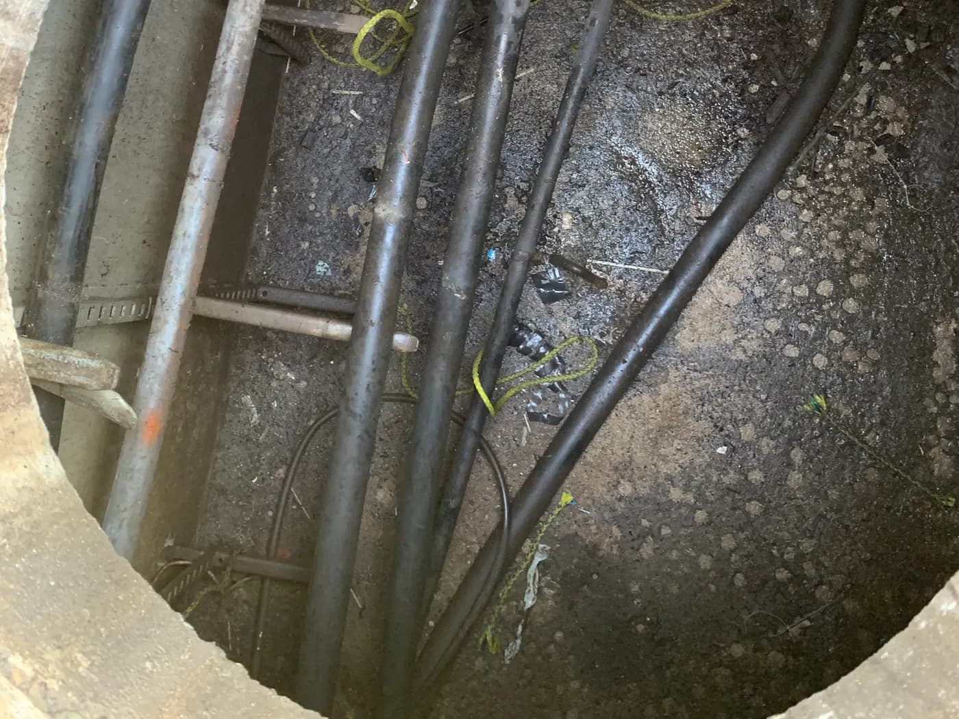 Underground duct bank with multiple cable runs entering a utility vault